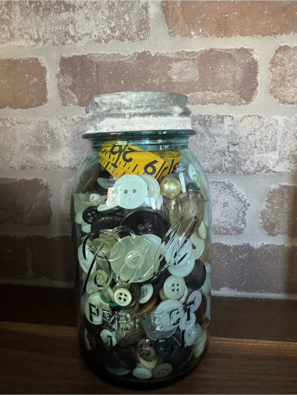 Vintage Mason Jar Filled with Assorted Buttons  and a few sewing odds and ends